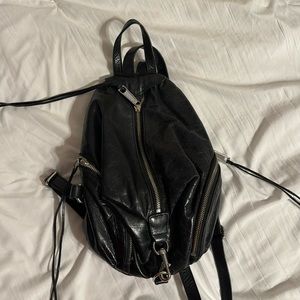 Rebecca Minkoff black backpack. No tears or heavy wear.  Gently used condition.